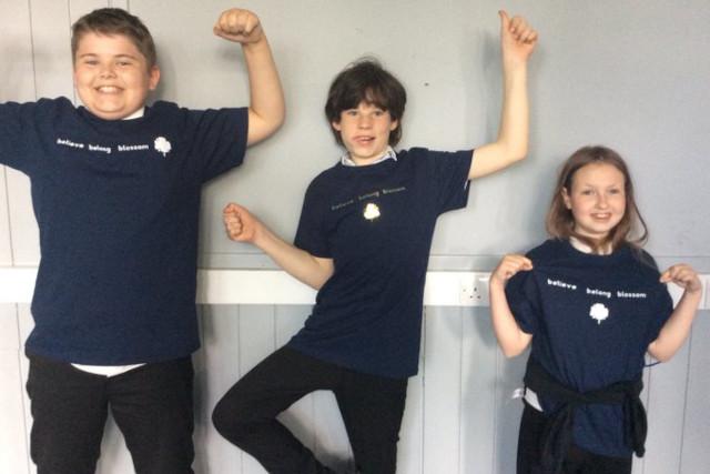 Three children stood in a line